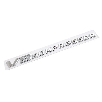 Logo V6 V8 Kompressor Mercedes Noir Chrome - vue rapprochée - Becquet Voiture