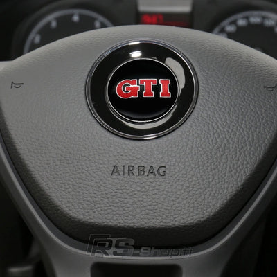 Logo Volant Aluminium VW Golf 5 6 7 GTI R - en situation - Becquet Voiture