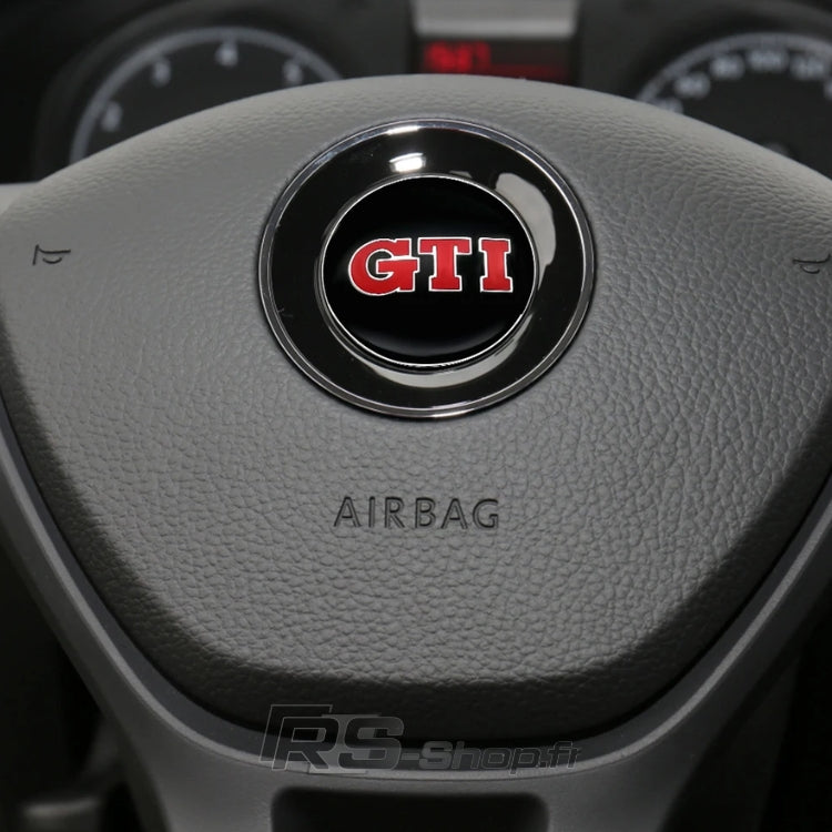 Logo Volant Aluminium VW Golf 5 6 7 GTI R - en situation - Becquet Voiture