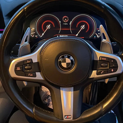Palette au volant BMW Série X et Génération G - vue de trois-quarts - Becquet Voiture