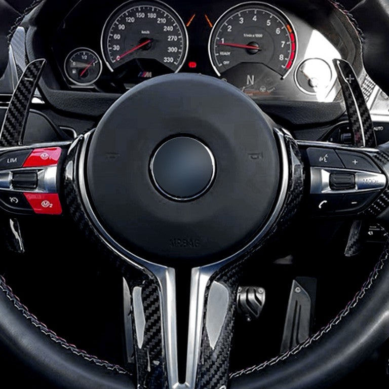 Palette au volant carbone BMW M5 competition - Garantie 1 an - vue de face - Becquet Voiture
