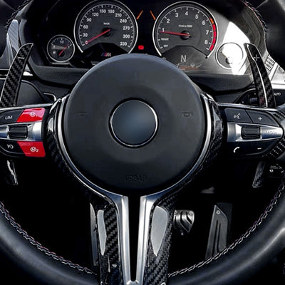 Palette au volant carbone BMW M5 competition - Garantie 1 an - vue de face - Becquet Voiture