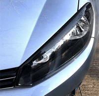 Performance-Scheinwerferabdeckungen VW Golf 6 Schwarz glänzend - Dreiviertelansicht - Becquet Voiture