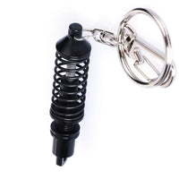 Adjustable Shock Absorber Keychain Suspension 7cm - front view - Becquet Voiture
