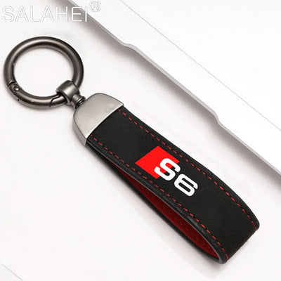 Porte Clé Audi Logo Métal Noir Modèles Variés - vue de profil 2 - Becquet Voiture