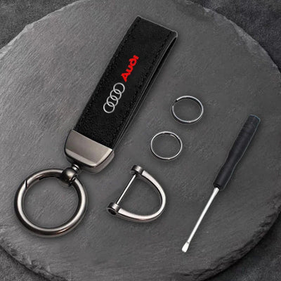 Porte Clé Audi Logo Métal Noir Modèles Variés - vue de profil - Becquet Voiture