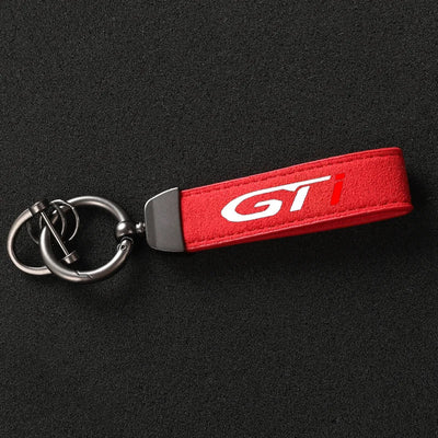 Porte Clé Peugeot GTI GT Line Alcantara - détail du montage - Becquet Voiture