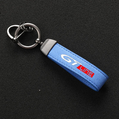 Porte Clé Peugeot GTI GT Line Alcantara - vue de trois-quarts - Becquet Voiture