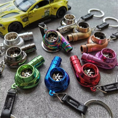 https://cdn.shopify.com/s/files/1/0727/0635/9572/files/porte_cle_Turbo_1.jpg?v=1774434333