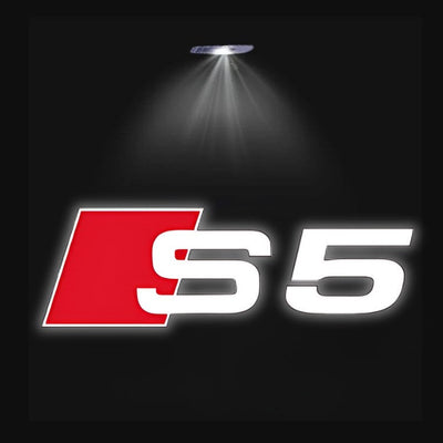 Projecteur LED Porte Logo Audi Éclairage Sol - vue de face 2 - Becquet Voiture