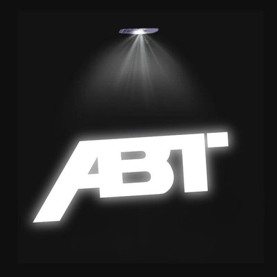 Projecteur LED Porte Logo Audi Éclairage Sol - vue de trois-quarts 2 - Becquet Voiture