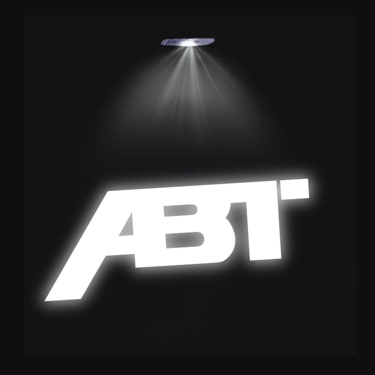 Projecteur LED Porte Logo Audi Éclairage Sol - vue de trois-quarts 2 - Becquet Voiture