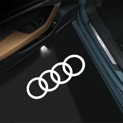 Projecteur logo porte voiture Audi Blanc - vue de face - Becquet Voiture