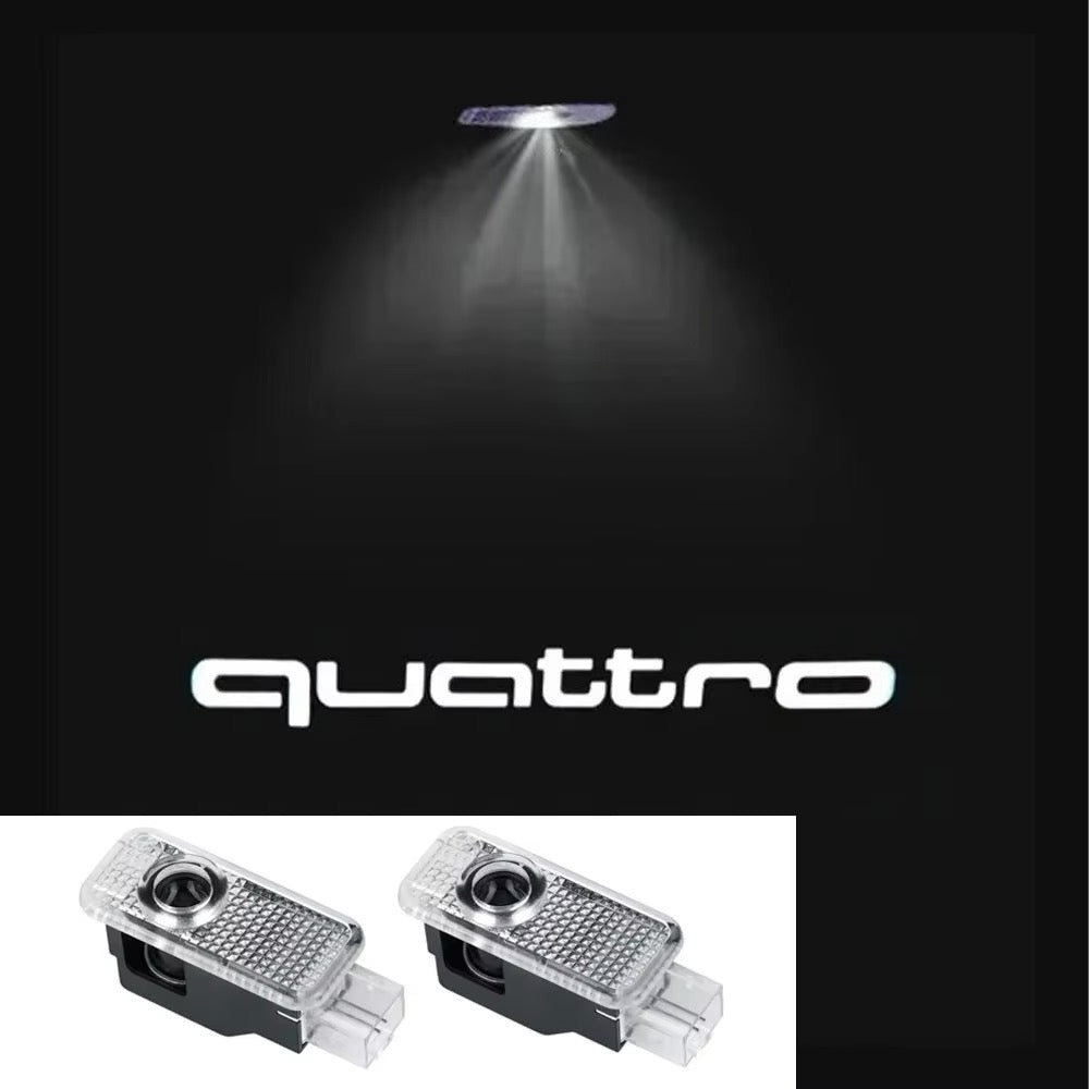 Projecteur logo porte voiture Audi Quattro - vue de face - Becquet Voiture