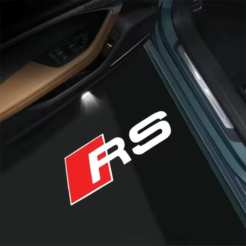 Projecteur logo porte voiture Audi RS - vue de face - Becquet Voiture