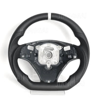 Volant Fibre de Carbone Cuir BMW E90 E92 E93 2005-2012 - détail du montage - Becquet Voiture