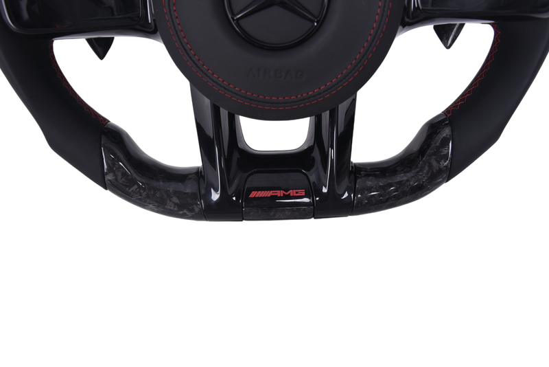 Volant Mercedes AMG 2014-2022 Cuir Alcantara Carbone Forgé - vue de trois-quarts - Becquet Voiture