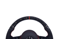Volant Sport BMW Série F Fibre Carbone Cuir Alcantara - vue de trois-quarts - Becquet Voiture