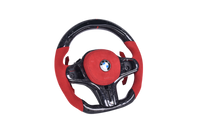Volant Sport BMW Série G Carbone Forgé Alcantara Rouge - vue de profil - Becquet Voiture