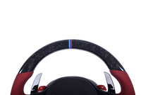 Volant Sport BMW Série G Cuir Rouge Sans Boutons M - vue de trois-quarts - Becquet Voiture