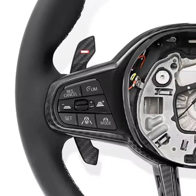 https://cdn.shopify.com/s/files/1/0565/4957/2747/files/volant_bmw_g20_boutons.jpg?v=1772897441