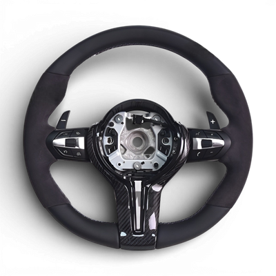 https://cdn.shopify.com/s/files/1/0565/4957/2747/files/volant_bmw_pack_m_-_cuir_lisse_haut_bas_-_carbone_centre_-_alcantara_-_palettes_-_logo_-_coutures_M.png?v=1772905313