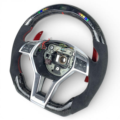 https://cdn.shopify.com/s/files/1/0565/4957/2747/files/volantmercedes25.jpg?v=1772921360